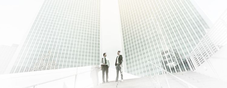 Two business men under highrise buildings_07.jpg
